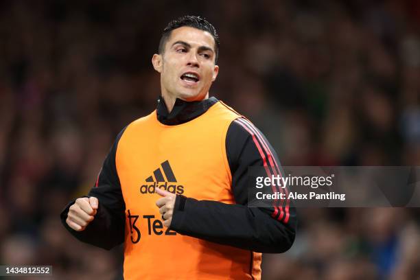 Cristiano Ronaldo of Manchester United warms up on the sidelines during the Premier League match between Manchester United and Tottenham Hotspur at...