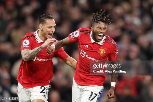 Fred of Manchester United celebrates with team mate Antony after scoring their sides first goal during the Premier League match between Manchester...