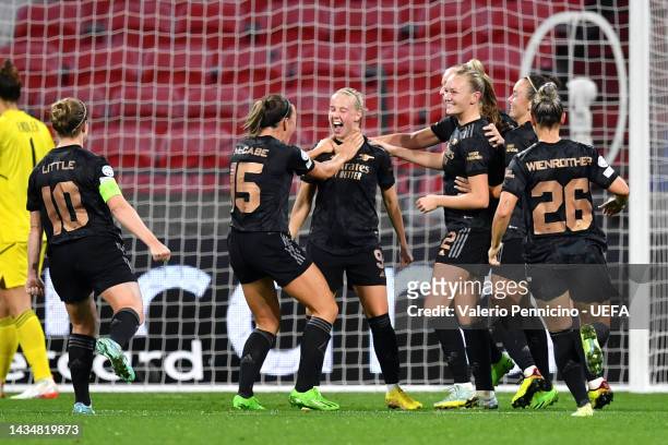 Beth Mead of Arsenal celebrates with team mates after scoring their sides fifth goal during the UEFA Women's Champions League group C match between...