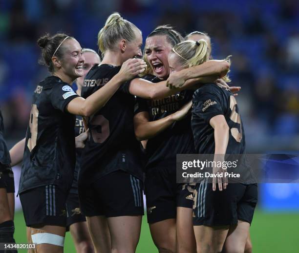 Beth Mead celebrates scoring Arsenal's 5th goal with Katie McCabe during the UEFA Women's Champions League Group C match between Olympique Lyon and...