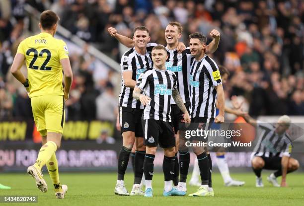 Nick Pope joins in with the celebrations as team mates Sven Botman, Kieran Trippier, Dan Burn and Fabian Schar celebrates their side's win after the...