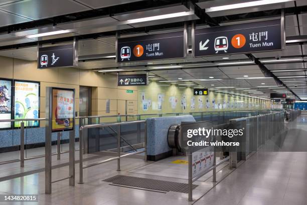 mtr to kwa wan station in kowloon, hong kong - tuen mun stock pictures, royalty-free photos & images