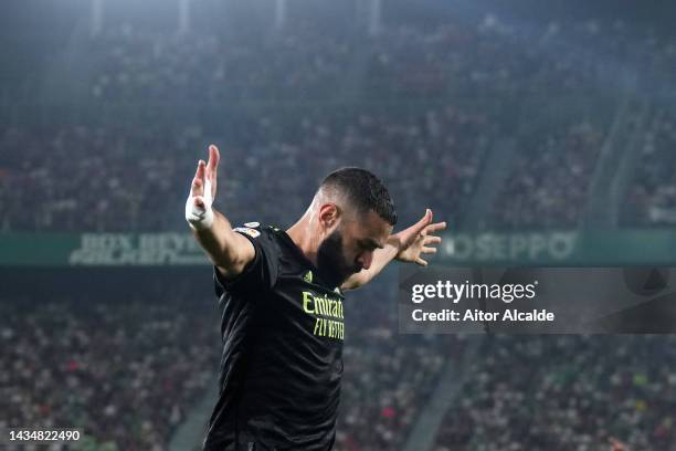 Karim Benzema of Real Madrid celebrates after scoring their sides goal which is later disallowed during the LaLiga Santander match between Elche CF...