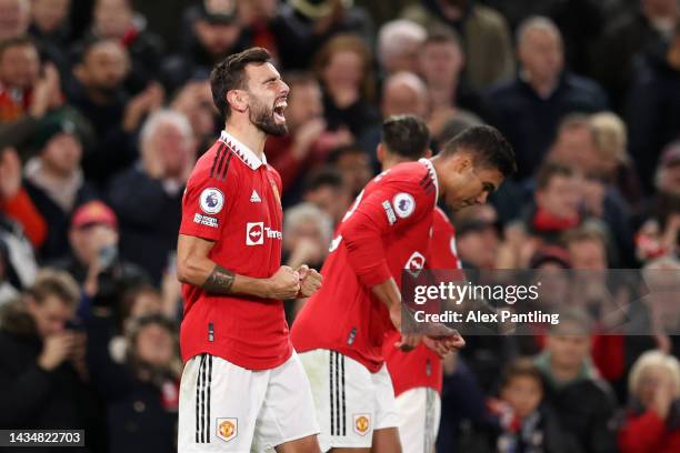 Bruno Fernandes of Manchester United celebrates after scoring their sides second goal during the Premier League match between Manchester United and...