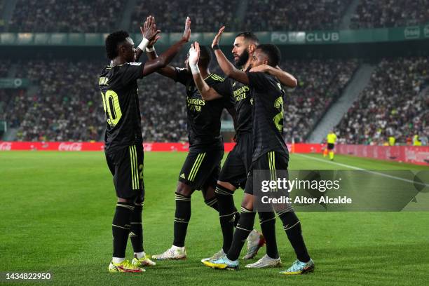 Karim Benzema of Real Madrid celebrates with team mates after scoring their sides goal which is later disallowed during the LaLiga Santander match...