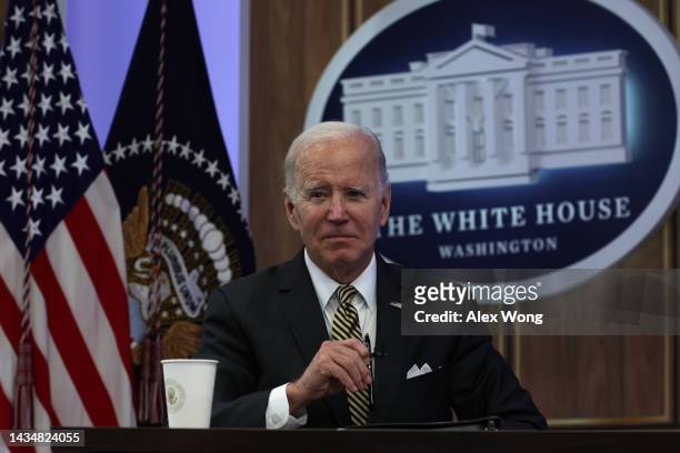 President Joe Biden listens during an event on the Bipartisan Infrastructure Law at the South Court Auditorium at Eisenhower Executive Office...