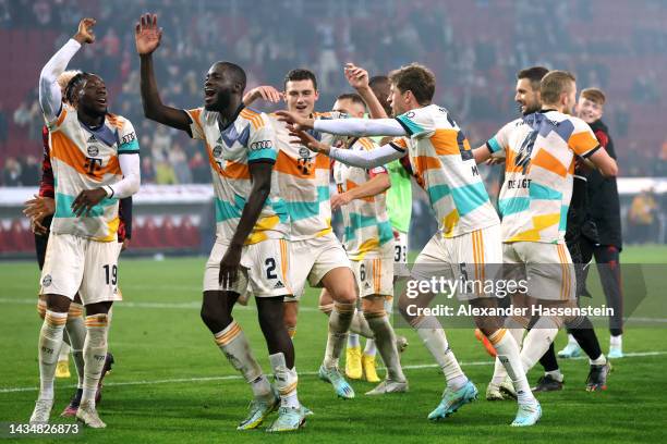 Players of Bayern Munich celebrates their side's win after the final whistle of the DFB Cup second round match between FC Augsburg and FC Bayern...