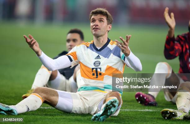 Thomas Mueller of Bayern Muenchen celebrate with the fans after their sides victory during the DFB Cup second round match between FC Augsburg and FC...