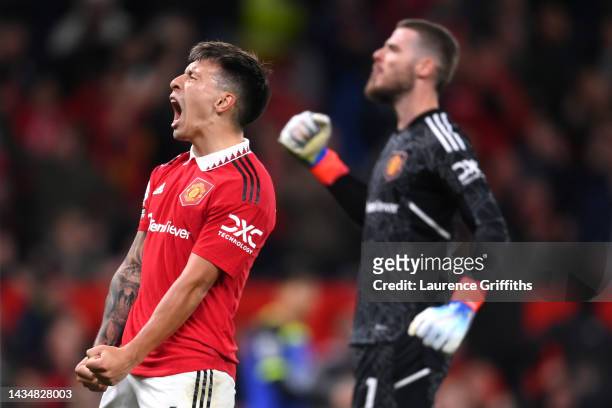 Lisandro Martinez and David de Gea of Manchester United celebrate after their sides victory during the Premier League match between Manchester United...