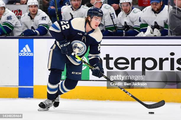 Jake Bean of the Columbus Blue Jackets skates with the puck during the first period of a game against the Vancouver Canucks at Nationwide Arena on...