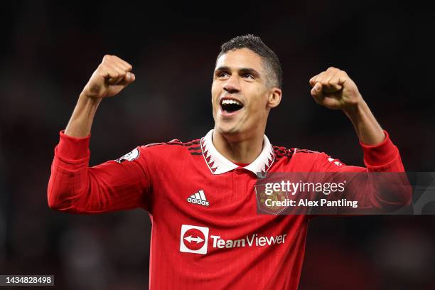 Raphael Varane of Manchester United celebrates after their sides victory during the Premier League match between Manchester United and Tottenham...