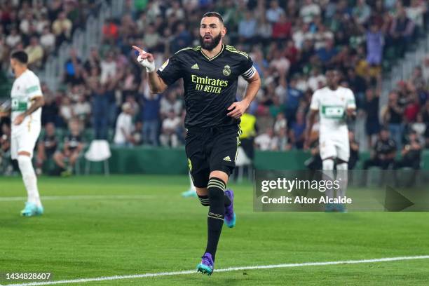 Karim Benzema of Real Madrid celebrates scoring their side's second goal which was later disallowed during the LaLiga Santander match between Elche...