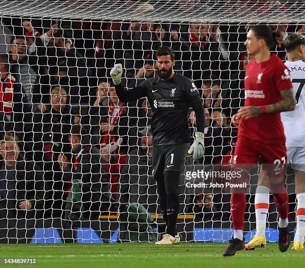 Alisson Becker of Liverpool in action during the Premier League match between Liverpool FC and West Ham United at Anfield on October 19, 2022 in...
