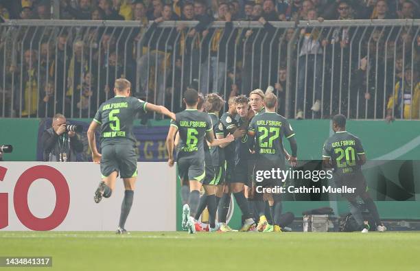 The Player of VfL Wolfsburg celebrate after their sides first goal during the DFB Cup second round match between Eintracht Braunschweig and VfL...