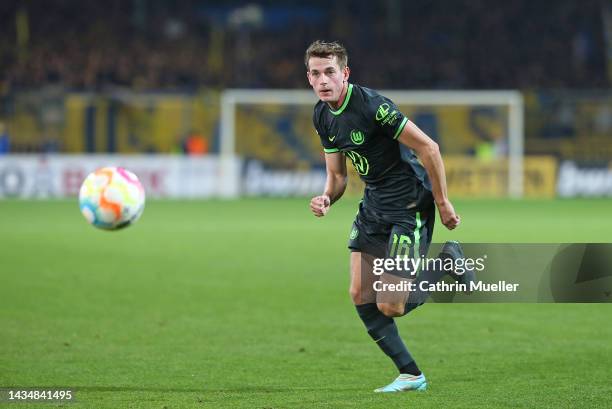 Jakub Kaminski of VfL Wolfsburg runs with the ball during the DFB Cup second round match between Eintracht Braunschweig and VfL Wolfsburg at...