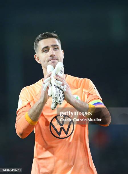Koen Casteels, goalkeeper of VfL Wolfsburg applauds fans after following their side's victory in the DFB Cup second round match between Eintracht...