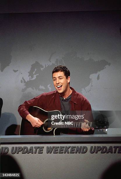 Episode 7 -- Air Date -- Pictured: Adam Sandler performs 'The Chanukah Song' during "Weekend Update" on December 3, 1994