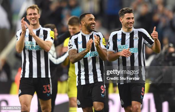 Callum Wilson and Fabian Schar of Newcastle United share a joke as they applaud the fans after the Premier League match between Newcastle United and...