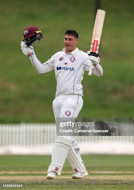 Matthew Renshaw of the Bulls celebrates scoring a century during the Sheffield Shield match between New South Wales and Queensland at Drummoyne Oval,...