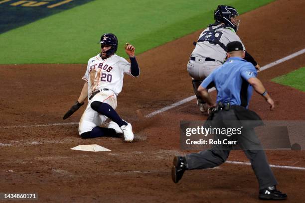 Chas McCormick of the Houston Astros scores a run during the second inning against the New York Yankees in game one of the American League...