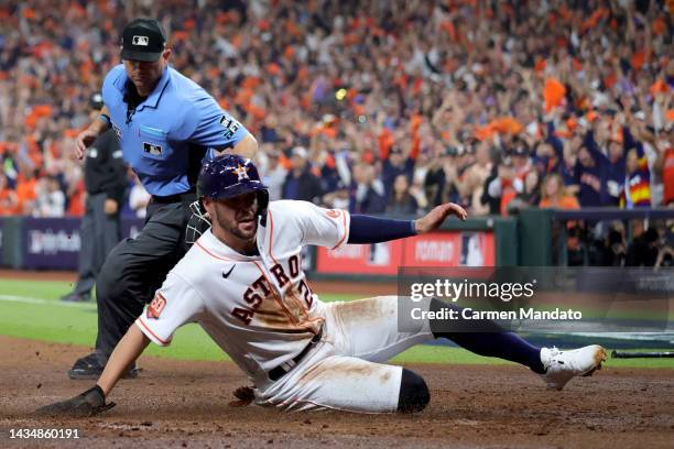 Chas McCormick of the Houston Astros scores a run during the second inning against the New York Yankees in game one of the American League...