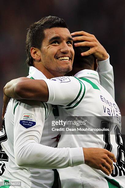 Matias Jones of Groningen celebrates scoring the first goal of the game with Lorenzo Burnet during the Eredivisie match between FC Groningen and De...