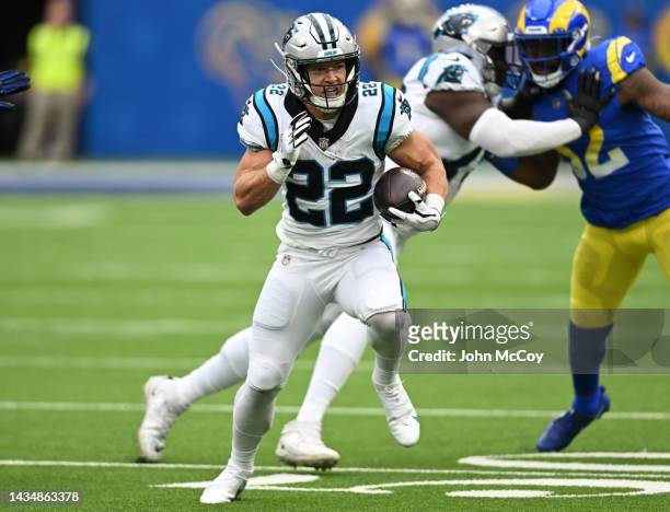 Christian McCaffrey of the Carolina Panthers runs the ball while playing the Los Angeles Rams at SoFi Stadium on October 16, 2022 in Inglewood,...