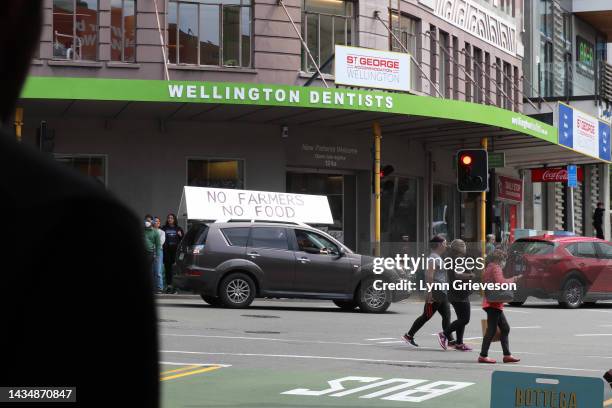 Car with a large "No Farmers No Food" drives in central Wellington as part of a Groundswell protest against government regulation and climate change...