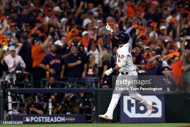 Yuli Gurriel of the Houston Astros celebrates a solo home run during the sixth inning against the New York Yankees in game one of the American League...