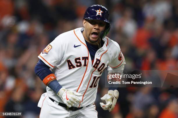 Yuli Gurriel of the Houston Astros celebrates a solo home run during the sixth inning against the New York Yankees in game one of the American League...