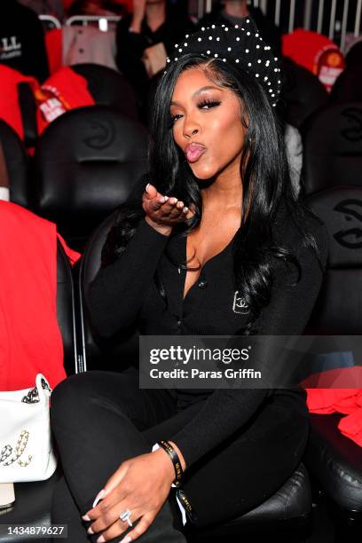 Porsha Williams attend the season home opener game between the Houston Rockets and the Atlanta Hawks at State Farm Arena on October 19, 2022 in...