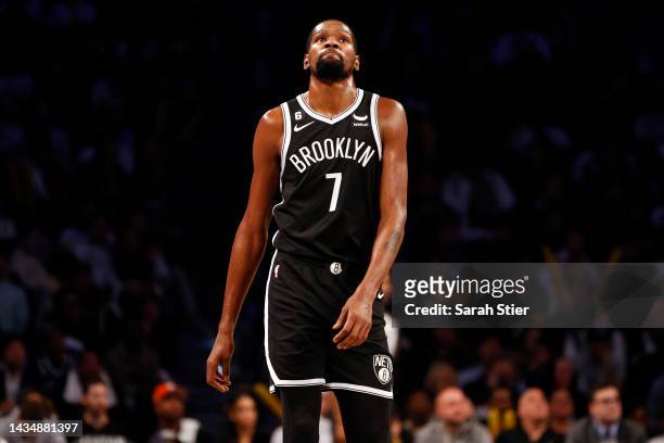 Kevin Durant of the Brooklyn Nets reacts during the second half against the New Orleans Pelicans at Barclays Center on October 19, 2022 in the...