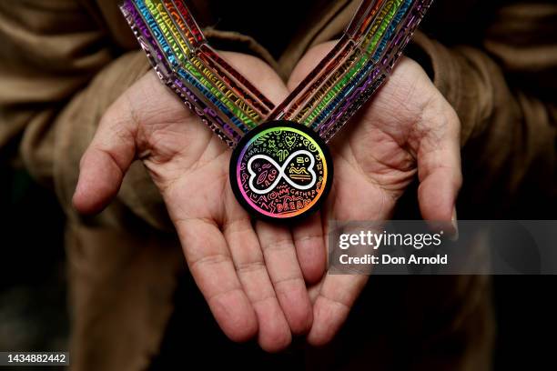 Paul Capsis poses with his Rainbow Champion medal during the Sydney WorldPride Rainbow Champion announcement at The Imperial Hotel on October 20,...