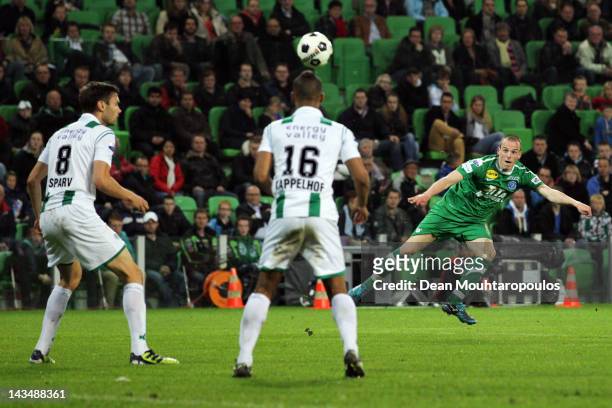 Anco Jansen of De Graafschap shoots and scores his teams first goal of the game past goalkeeper, Luciano da Silva of Groningen during the Eredivisie...