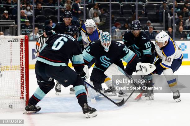 Brayden Schenn of the St. Louis Blues scores against Martin Jones of the Seattle Kraken during the first period at Climate Pledge Arena on October...