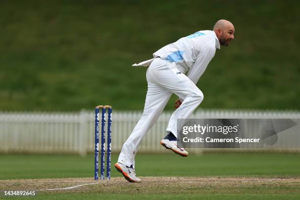 Nathan Lyon of New South Wales bowls during the Sheffield Shield match between New South Wales and Queensland at Drummoyne Oval, on October 20 in...