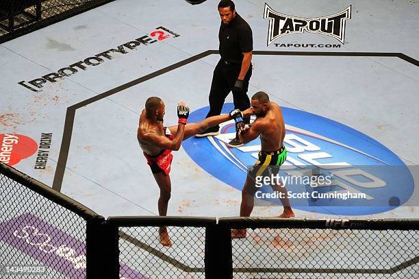 Jon Jones lands a kick against Rashad Evans during UFC 145 at Philips Arena on April 21, 2012 in Atlanta, Georgia.