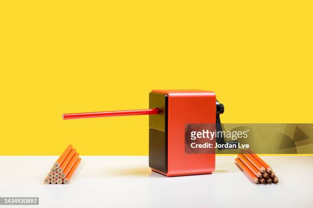 pencil sharpener with sharpen your saw concept - pencil sharpener stockfoto's en -beelden