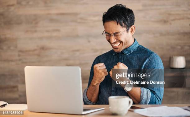 success, winner and businessman on laptop in office celebrating winning, business deal or sales growth. wow, entrepreneur or male from canada in celebration of financial goals, mission or targets. - business milestones stock pictures, royalty-free photos & images