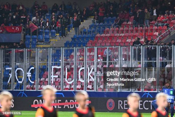 Fans of Bayern show their protest because of he high prices of the UEFA tickets. The first minutes of the match the stay away and left the tribune...