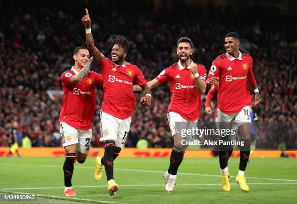 Fred of Manchester United celebrates with team mates Antony, Bruno Fernandes and Marcus Rashford after he scores his sides first goal during the...