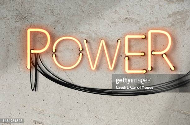 power text in neon light - rock font stock pictures, royalty-free photos & images