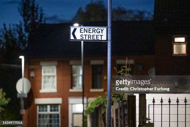 Street sign for Energy Street stands near homes on October 19, 2022 in Manchester, England. The British utility company, National Grid, have said...