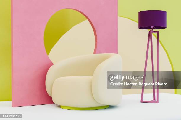 abstract interior with a sofa and lamp on geometry, pink, blue, green and purple colors, architecture concept - interiores-modelos fotografías e imágenes de stock