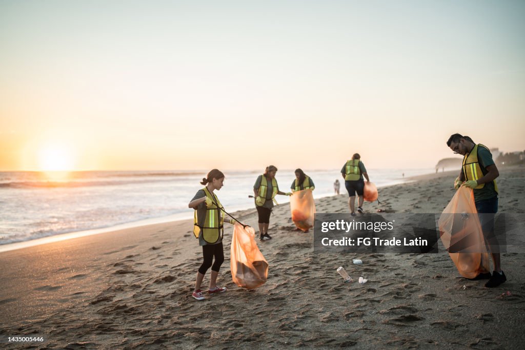 Recyclers cleaning the beach