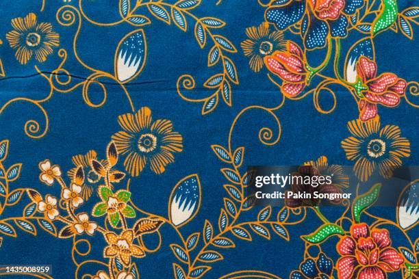 full frame thai silk traditional motif textile and texture background. - batik indonesia stock pictures, royalty-free photos & images