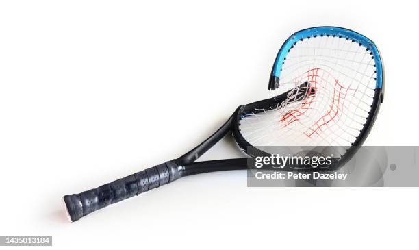 broken tennis racket - tennis racquet isolated stock pictures, royalty-free photos & images