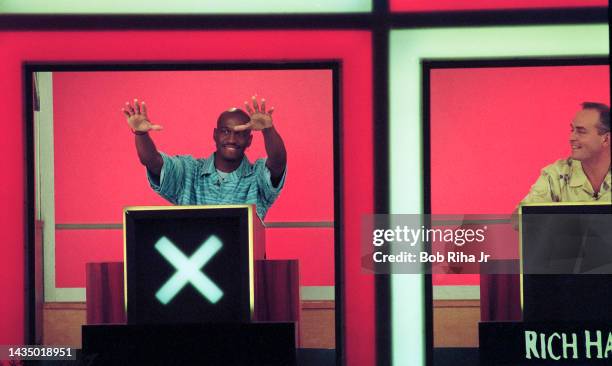 Richard Hatch and Gervase Peterson from tv show 'Survivors' during taping of 'Hollywood Squares' TV show, August 26, 2000 in Los Angeles, California.