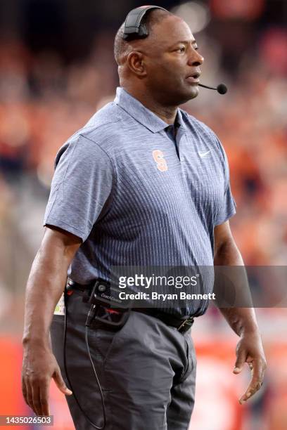 Head Coach Dino Babers of the Syracuse Orange looks on during the first quarter against the North Carolina State Wolfpack at JMA Wireless Dome on...