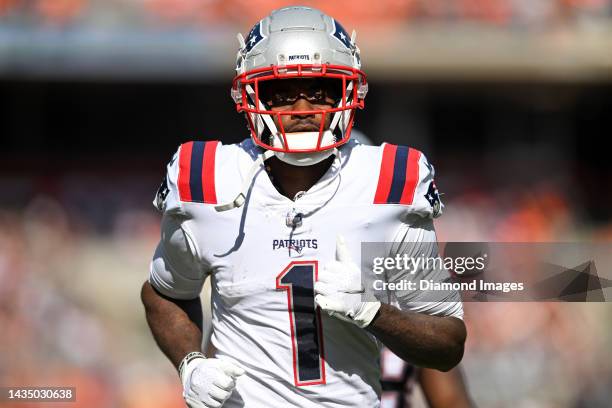 DeVante Parker of the New England Patriots runs off the field at halftime against the Cleveland Browns at FirstEnergy Stadium on October 16, 2022 in...